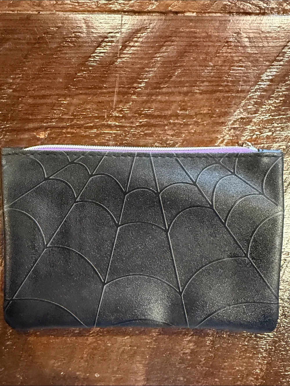 ipsy Black Satin Cosmetic Pouch with Purple Zipper and spider web on back